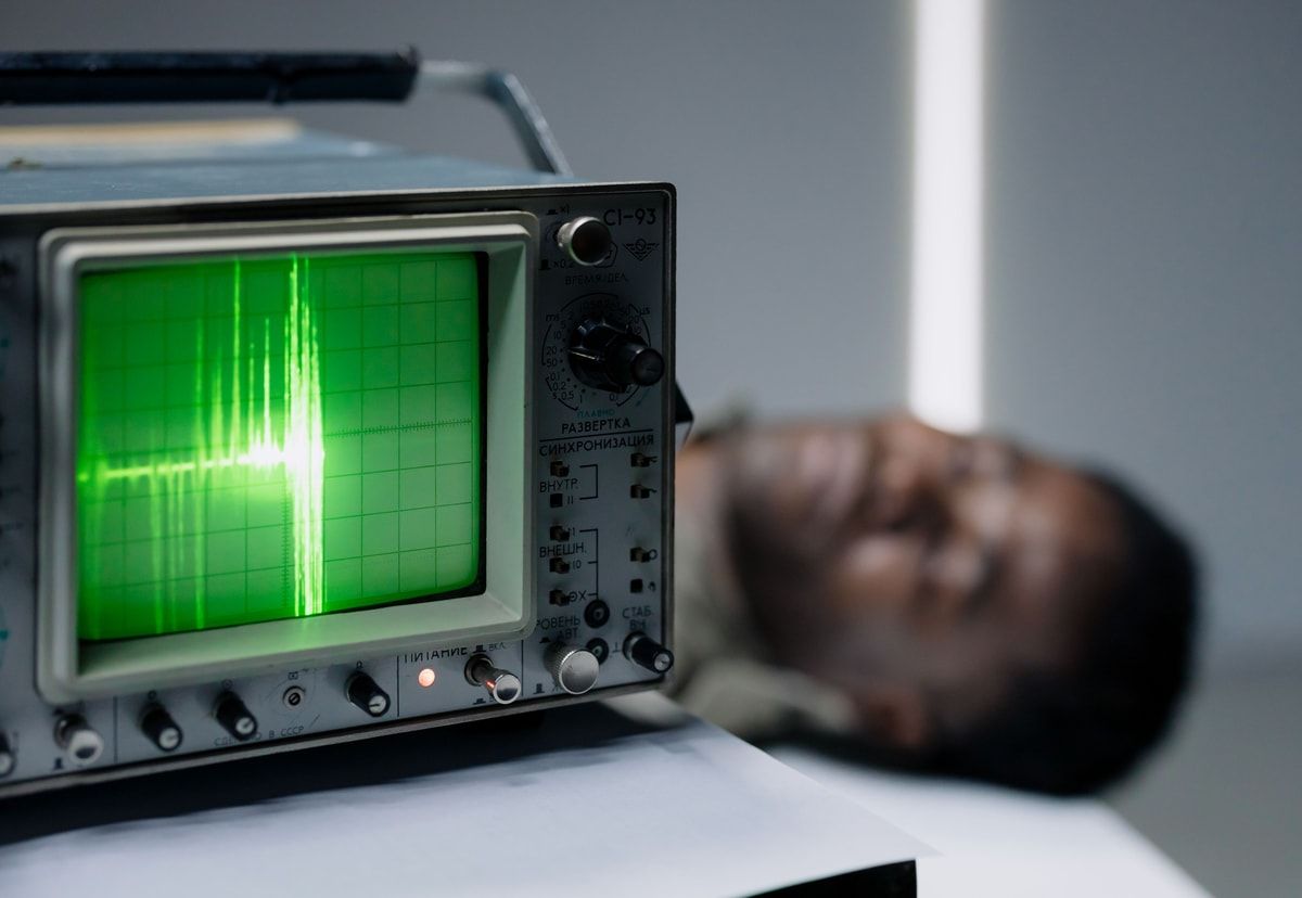 Oscilloscope displaying a bright measured waveform, representing application performance monitoring