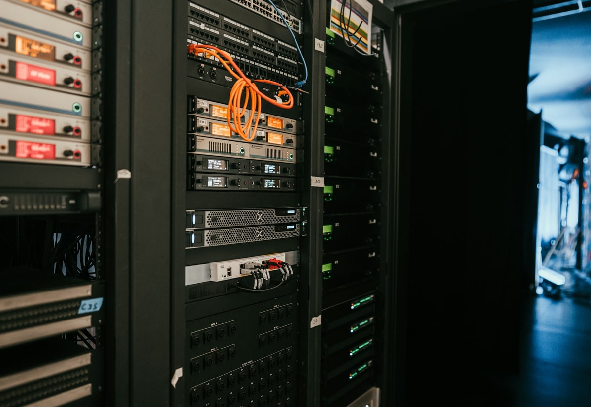 Server racks and network equipment inside a professionally managed data centre