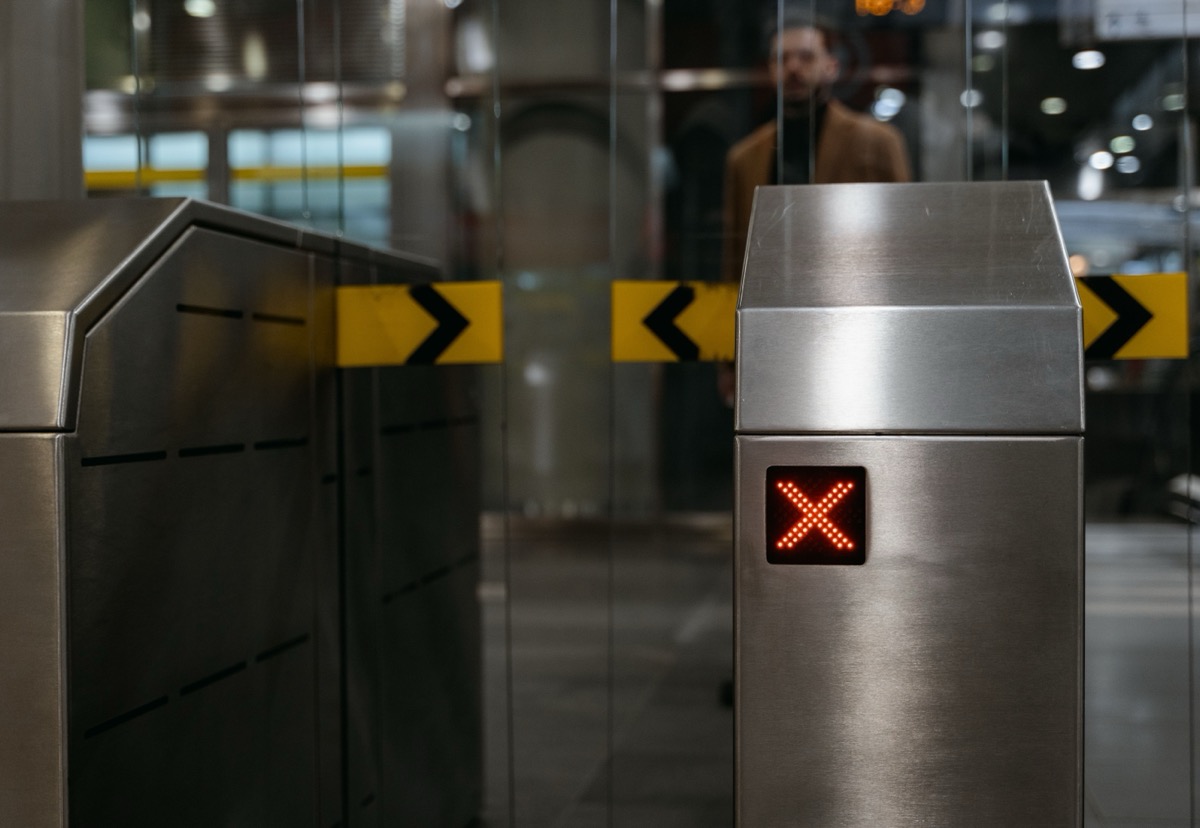 A blocked access gate representing a software decision that needs a clearer route
