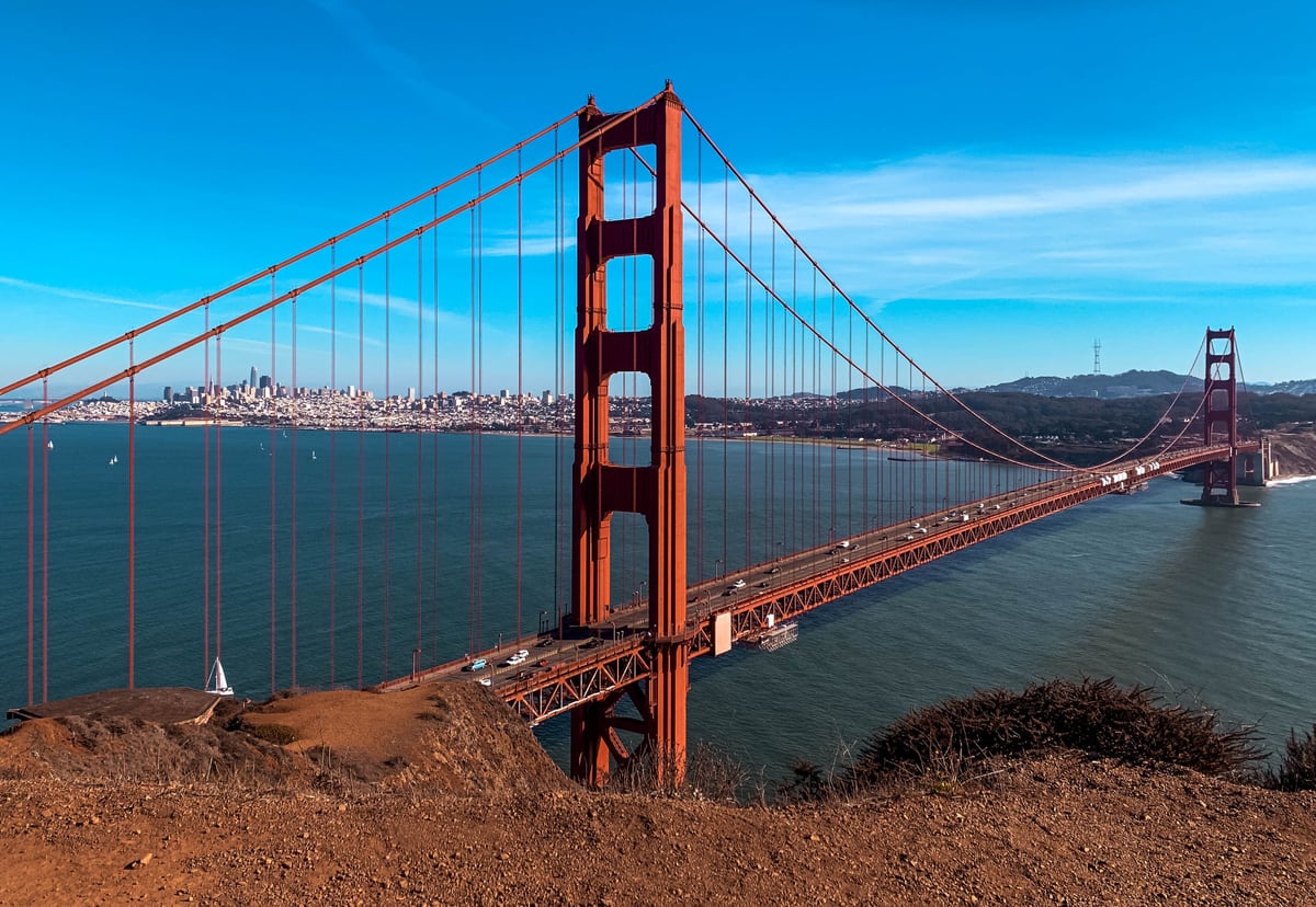 A bridge crossing water representing a clear route from business goals to technical roadmap